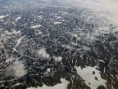 03 The Landscape Is Icy And Barren On Flight From Ottawa To Iqaluit Baffin Island Nunavut Canada For Floe Edge Adventure